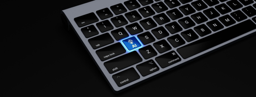 a black keyboard with a blue button on it